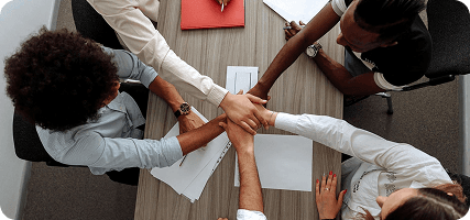 Team hands joined together